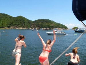 Jumping off a junk boat into the sea in Hong Kong