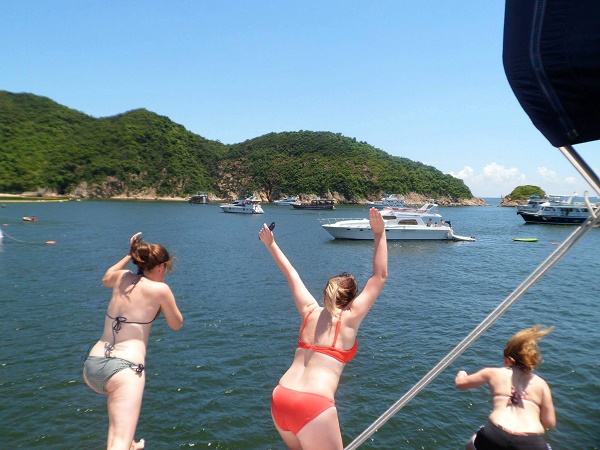 Jumping off a junk boat into the sea in Hong Kong