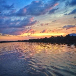 Sunset river cruise in Kampot, Cambodia