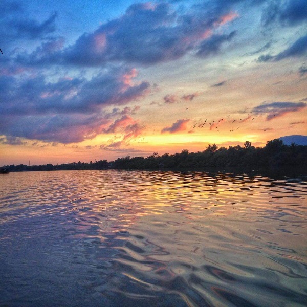 Sunset river cruise in Kampot, Cambodia