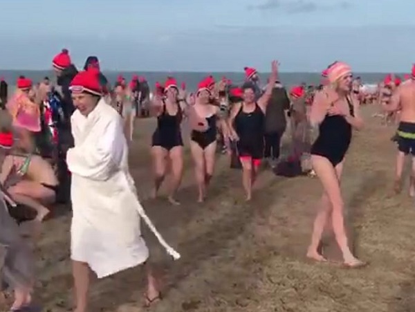 Running up Scheveningen Beach Den Haag Netherlands - New Year's Dive 2018