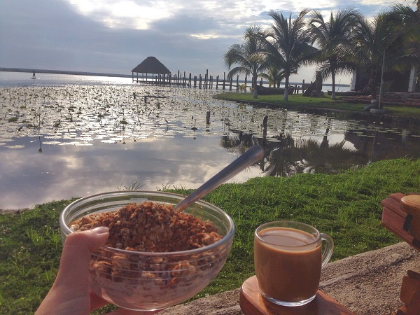 Morning view of Lake Bacalar, Mexico, with breakfast from the Yak Lake House hostel