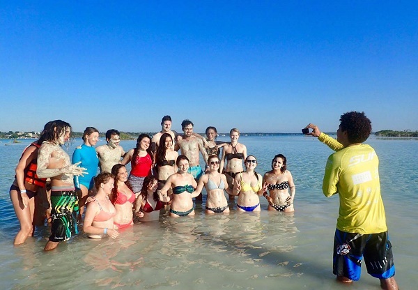 The stand-up paddleboarding group in the lake, Bacalar
