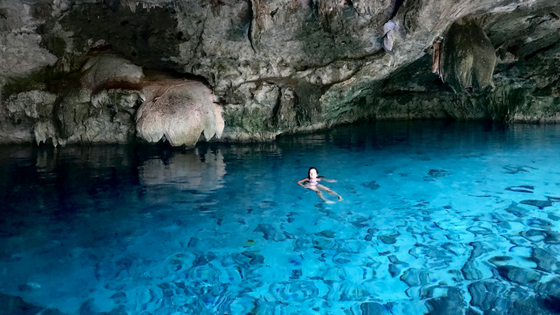 Clear blue water at Cenote Dos Ojos near Playa del Carmen, Yucatan, Mexico
