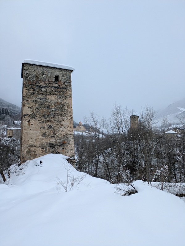 towers with snow in mestia